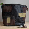 Large Wash Bag - Deadstock black waxed cotton with offcut applique detail